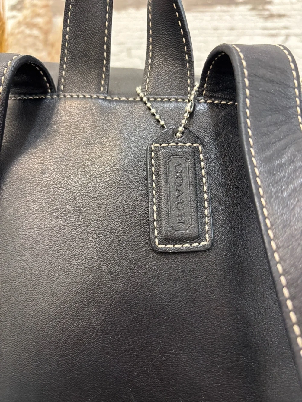 Coach Black Leather Drawstring Backpack with Silver Buckle